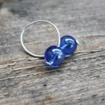 Ring met blauwe glasparels. Ring met blauwe glasparels.