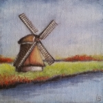 Molen langs de waterkant Molen langs de waterkant