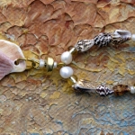 Ketting met diverse schelpen Ketting met diverse schelpen