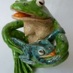 Kikkermamma met jong Kikkermamma met jong