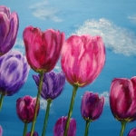 Colored tulips in the blue sky Colored tulips in the blue sky