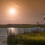 Hollands landschap bij zonsondergang Hollands landschap bij zonsondergang