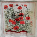 selfportrait on embroidered poppys by my late auntie Greet selfportrait on embroidered poppys by my late auntie Greet