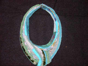 collars and brooches of mixed material.