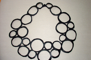 bracelets, chains and collars made of rubber.