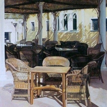 Terras met rieten stoelen Terras met rieten stoelen