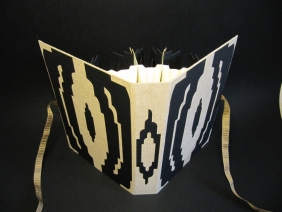Omslag Transmute (nummer 3). Omslag Transmute (nummer 3).