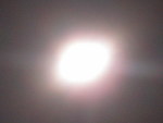Foto's van bijzondere verschijnselen overdag en 's avonds waaronder Ufo's, de zon en de maan.