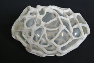 Papierklei gecombineerd met diverse materialen.