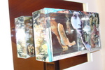 Driedimentionale collages op glas, gevat in dozen. Eventueel met bijkomende spiegels.