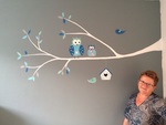 Muurschildering in babykamer