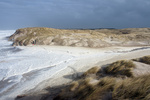 Nieuw zeeschuim in de Kerf! Tijdens het hoogtepunt van de vloed op 1 maart 2008 sloegen de golven over de drempel en het schuim vloog je om de oren....