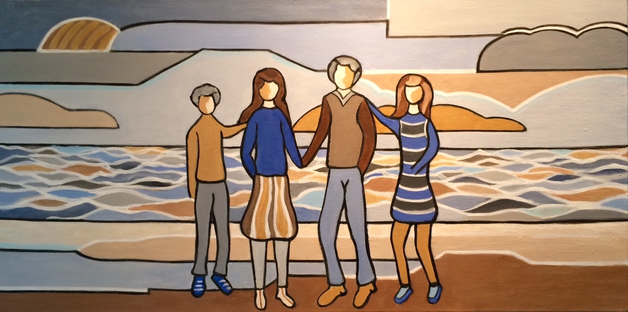 Happy family op het strand
