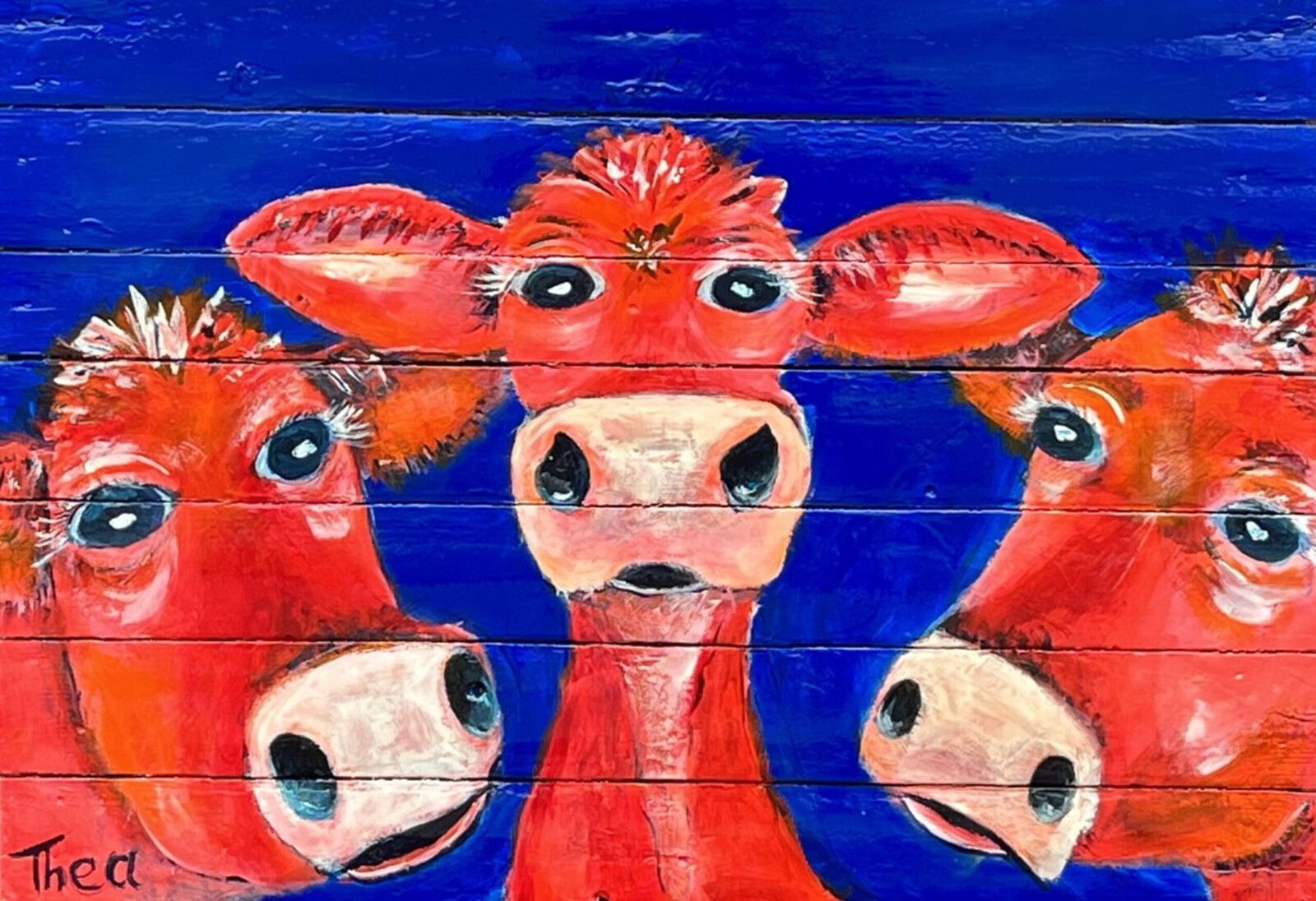 Vrolijke koeien op een pallet