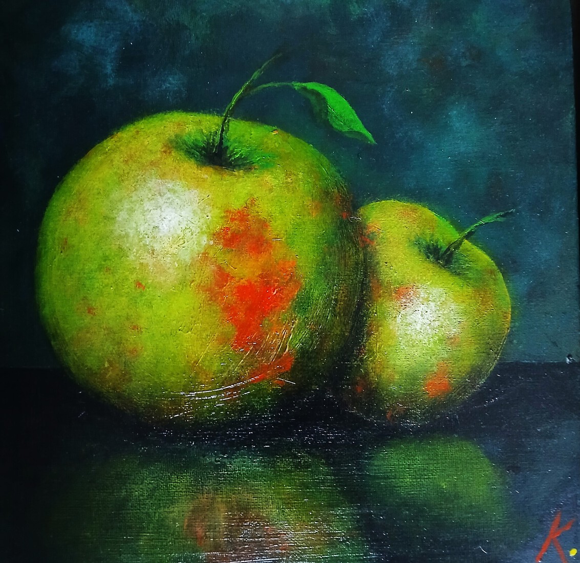 Twee appels op glimmende tafel