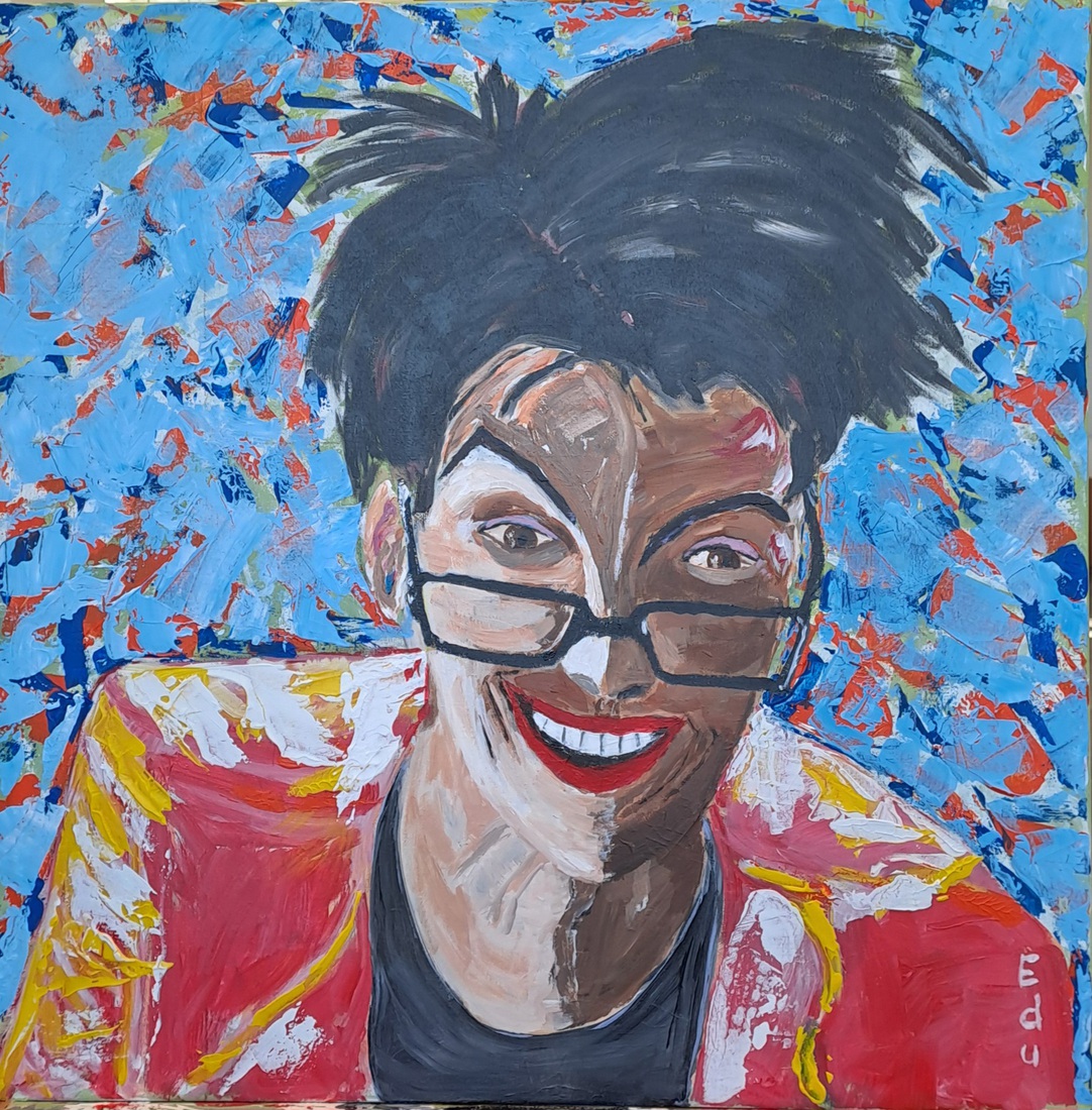 Rubi in green, orange and blue