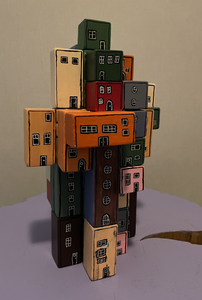 Wat begon als een lijn op papier, heeft nu een eigen plek in de ruimte gekregen. Deze handbeschilderde blokken vormen samen kleine architectonische werelden. Van een platte schets naar een tastbaar huisje: een spel van kleur, vorm en constructie.