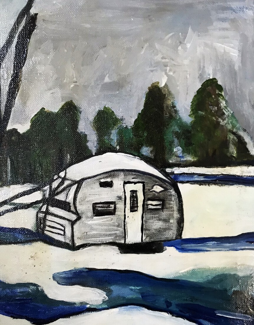 Caravan in de sneeuw