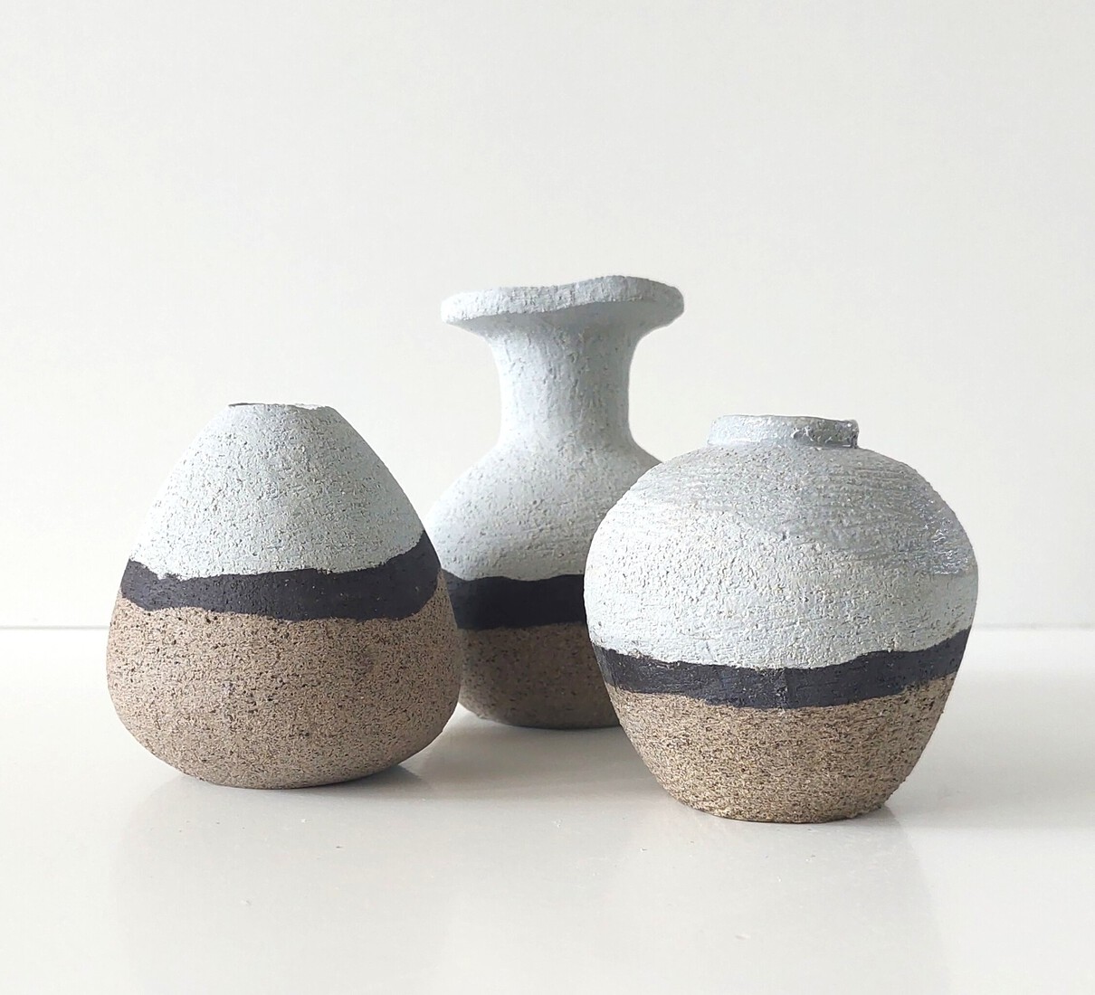 3 vaasjes zand/zwart/blauw