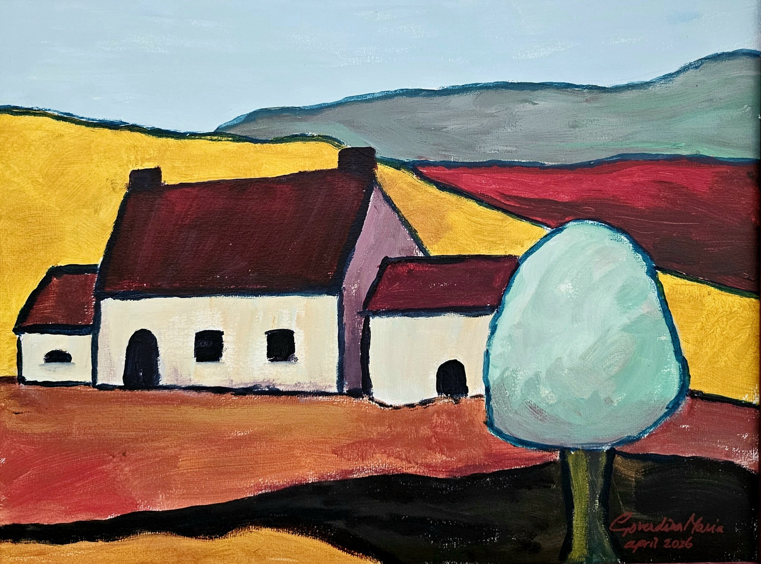 Wit huisje met bloesemboom