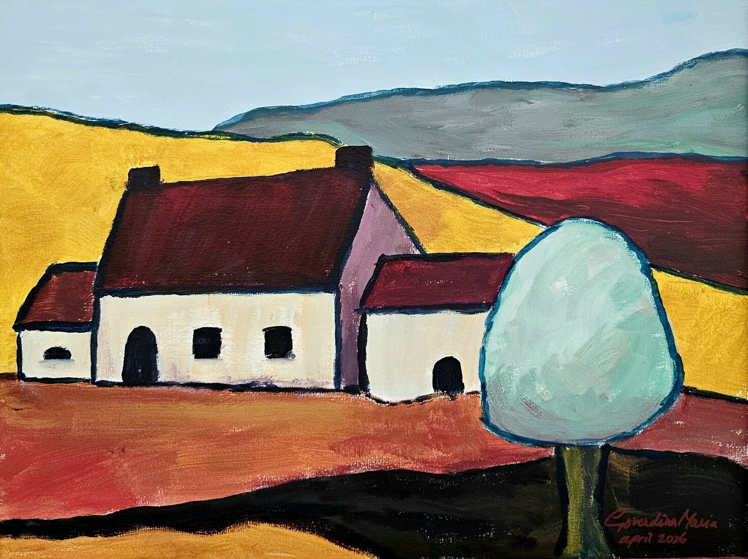 Wit huisje met bloesemboom