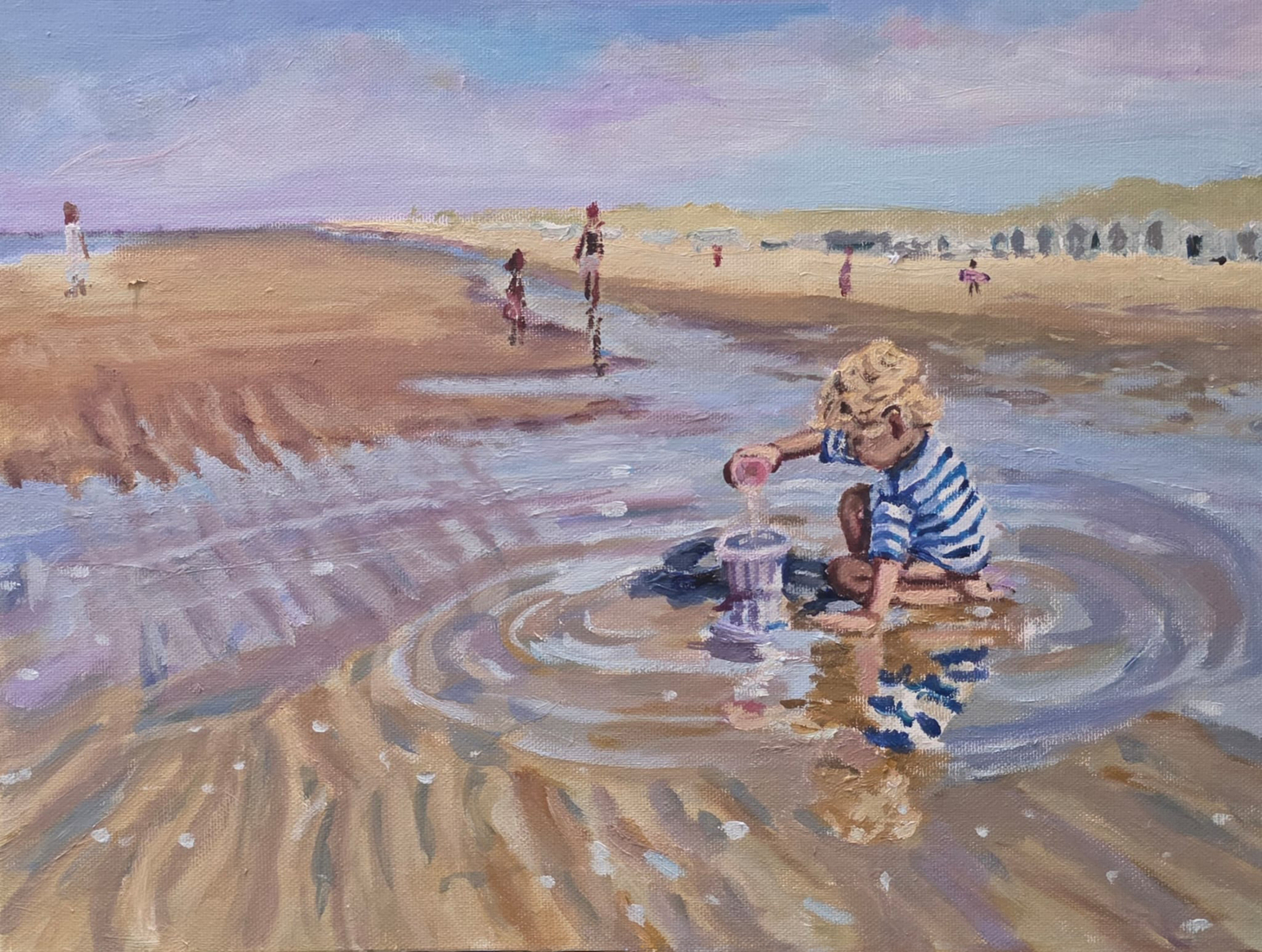 Spelen met water op het strand