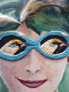People and animals combine their characteristics in a surreal scene. Animals take the leading role, rendered in acrylic paint with embroidery and the occasional bead.