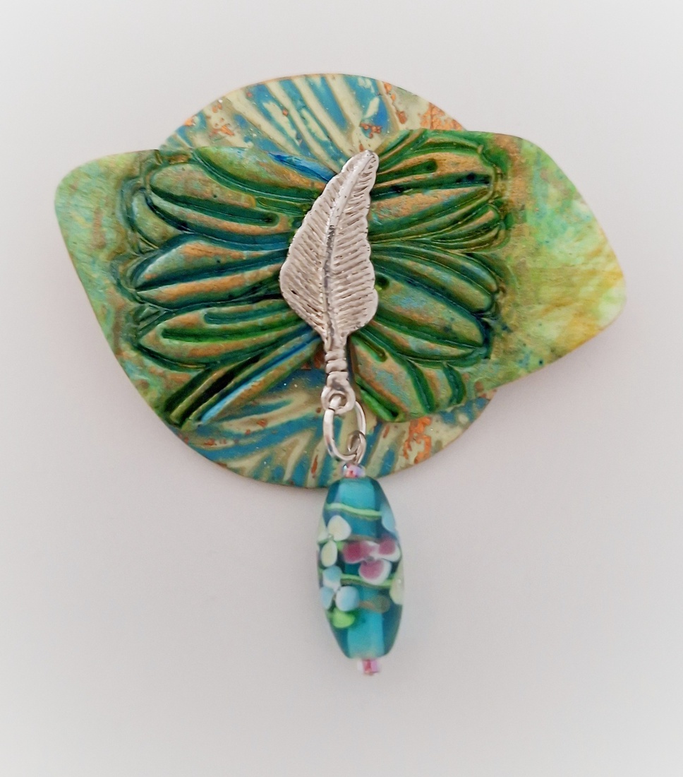 Broche Left over 2