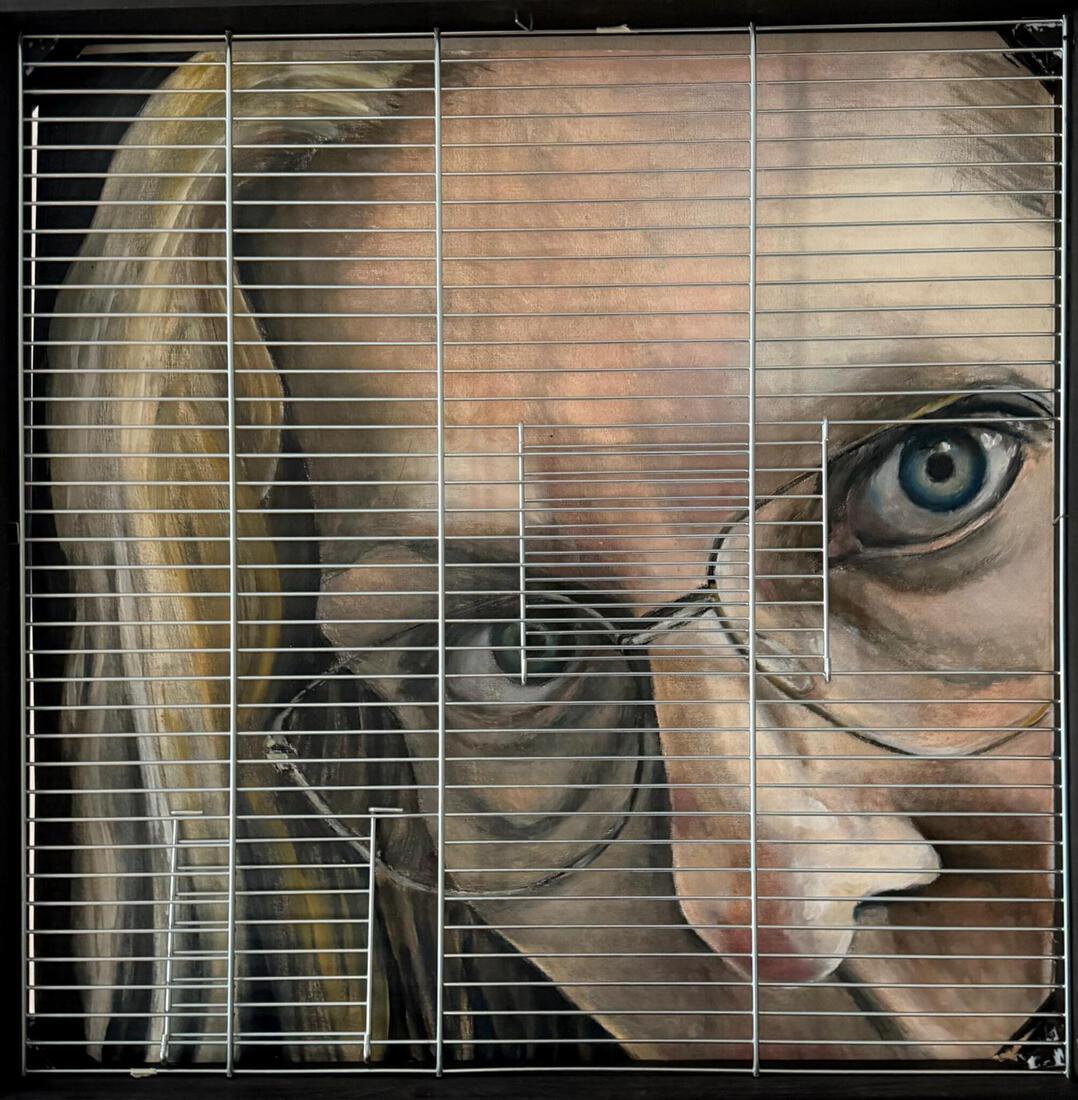 Zelfportret achter traliewerk