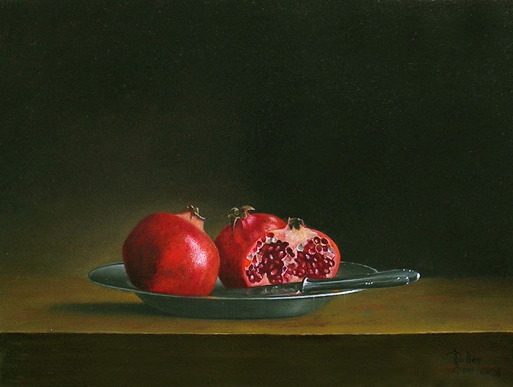 stilleven met granaatappels en mes