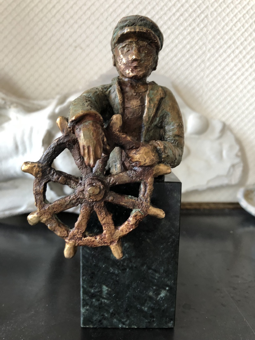 Schipper aan het roer