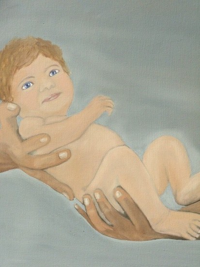 baby in handen