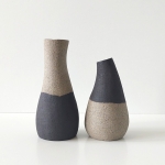 2 vaasjes zand/zwart zwart/zand