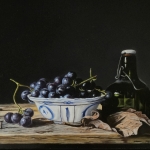 Druiven en groen beugelflesje