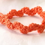 Koraal armbandje Wave