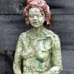 Groen meisje met rood haar