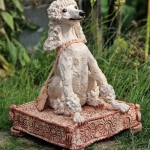 Poedel met Gucci-tasje