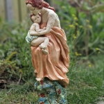 Moeder met kind op schoot