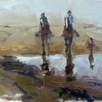 Horses on a rainy beach