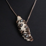 Knetterhard om je hals