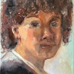 Jongen met bruin krullend haar