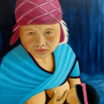 Aziatische moeder van de Akha stam met baby.