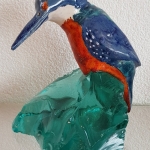 IJsvogeltje op turquoise glas