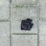 fietshandschoen op tegels