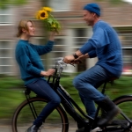 Arnemuid sweaters, riding the bike together.