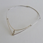 halssieraad geelgoud en zilver