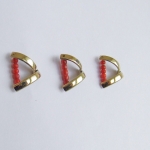 broche goud en bloedkoraal