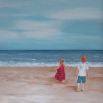 Jongen en meisje op het strand