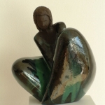 sitting in dark green