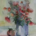 Rode bloemen in vaas